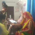 Malaria testing through RDT Kit By Asha during UHND visit at Slum Bada Ukhrra PC- geeta ramani FHI-EMBED-Health Dept, Agra. 01-05-2024