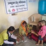 Malaria testing through RDT Kit By Asha during UHND visit at Slum Nagla mahadev PC- pulkit FHI-EMBED-Health Dept, Agra. 22-05-2024