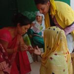 Malaria testing through RDT Kit By Asha during UHND Visit at slum shochalay wali gali PC- Deependra FHI-EMBED-Health Dept, Agra. 01-07-2024